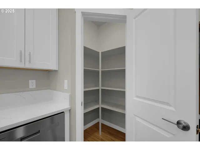 a kitchen with a sink stove and microwave