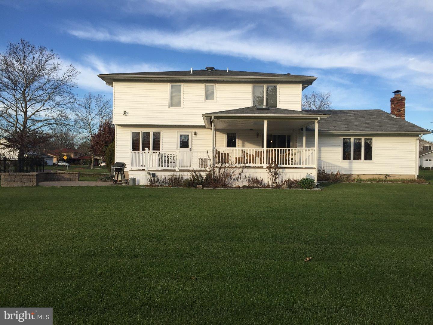 27 Peter Rafferty Drive Hamilton, NJ 08690 - Photo 11 of 15 a front view of a house with a yard