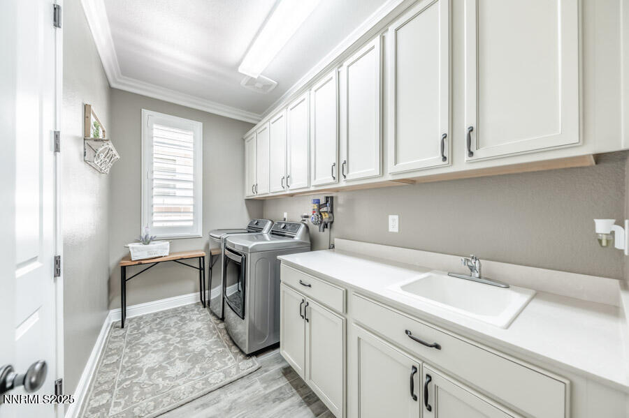 2295 Maximus Lane Reno, NV 89521 - Photo 25 of 62 a kitchen with granite countertop a sink stainless steel appliances and cabinets