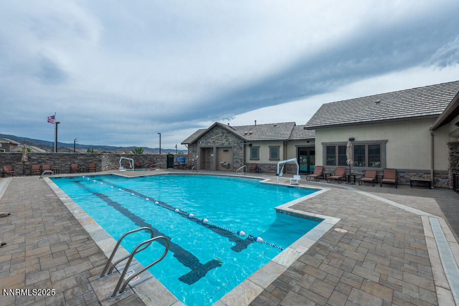 2295 Maximus Lane Reno, NV 89521 - Photo 47 of 62 a view of a house with swimming pool and sitting area