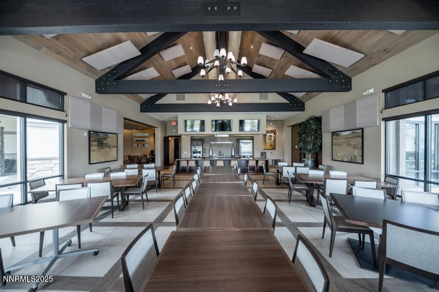 2295 Maximus Lane Reno, NV 89521 - Photo 53 of 62 a view of a dining room with furniture wooden floor and chandelier