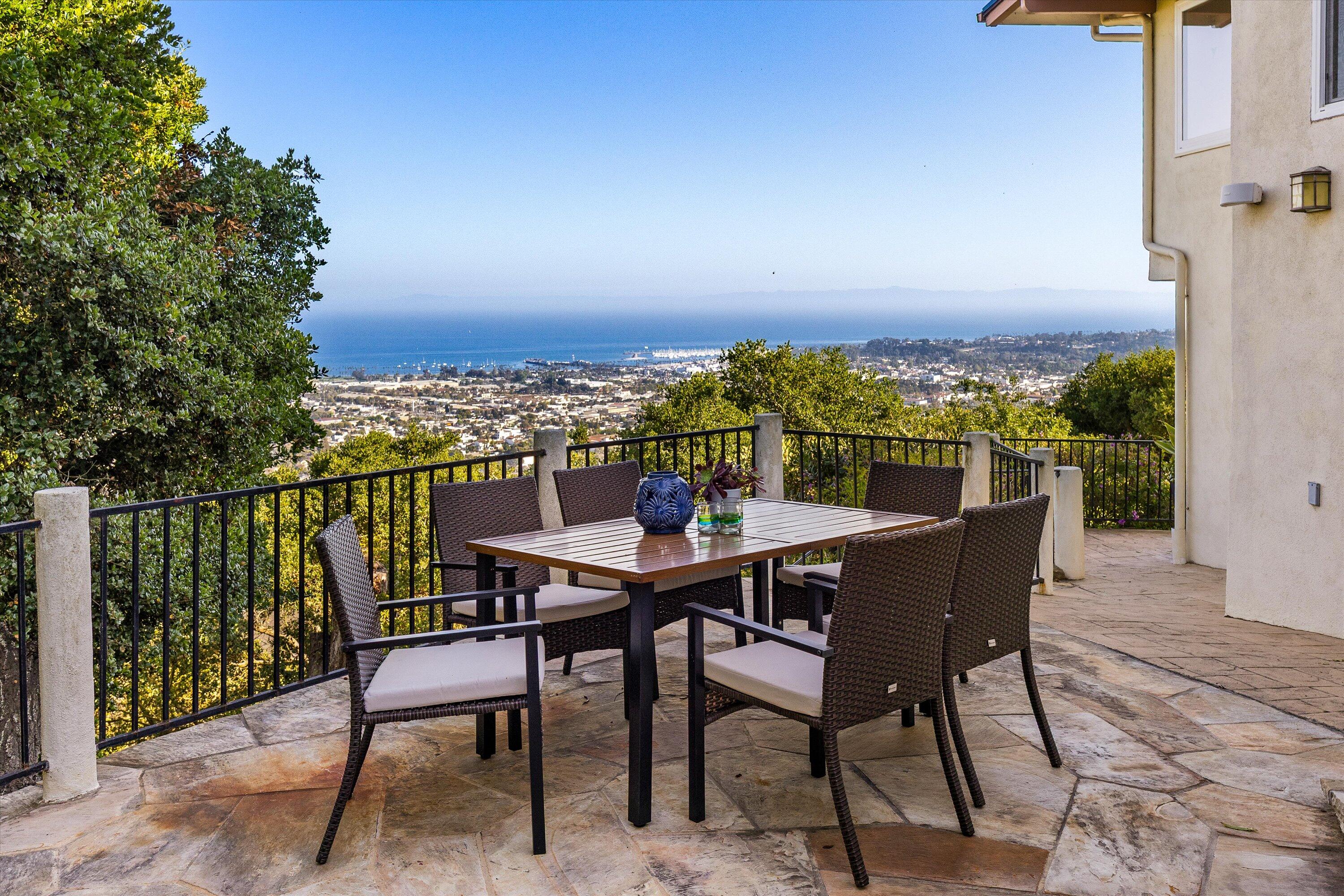 1227 Viscaino Road Santa Barbara, CA 93103 - Photo 14 of 25 a view of a chairs and table in the balcony