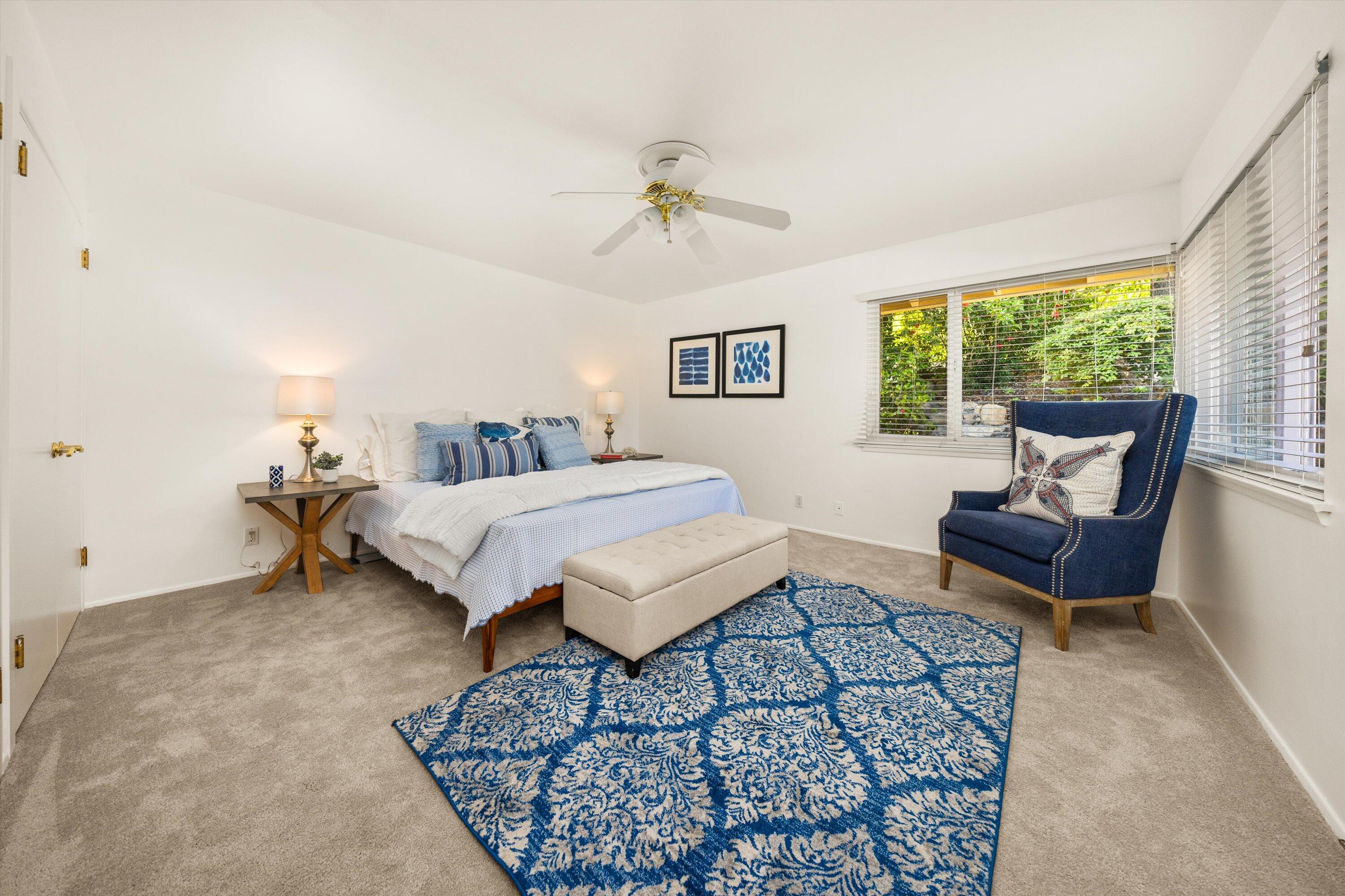 1227 Viscaino Road Santa Barbara, CA 93103 - Photo 17 of 25 a bedroom with furniture and a rug