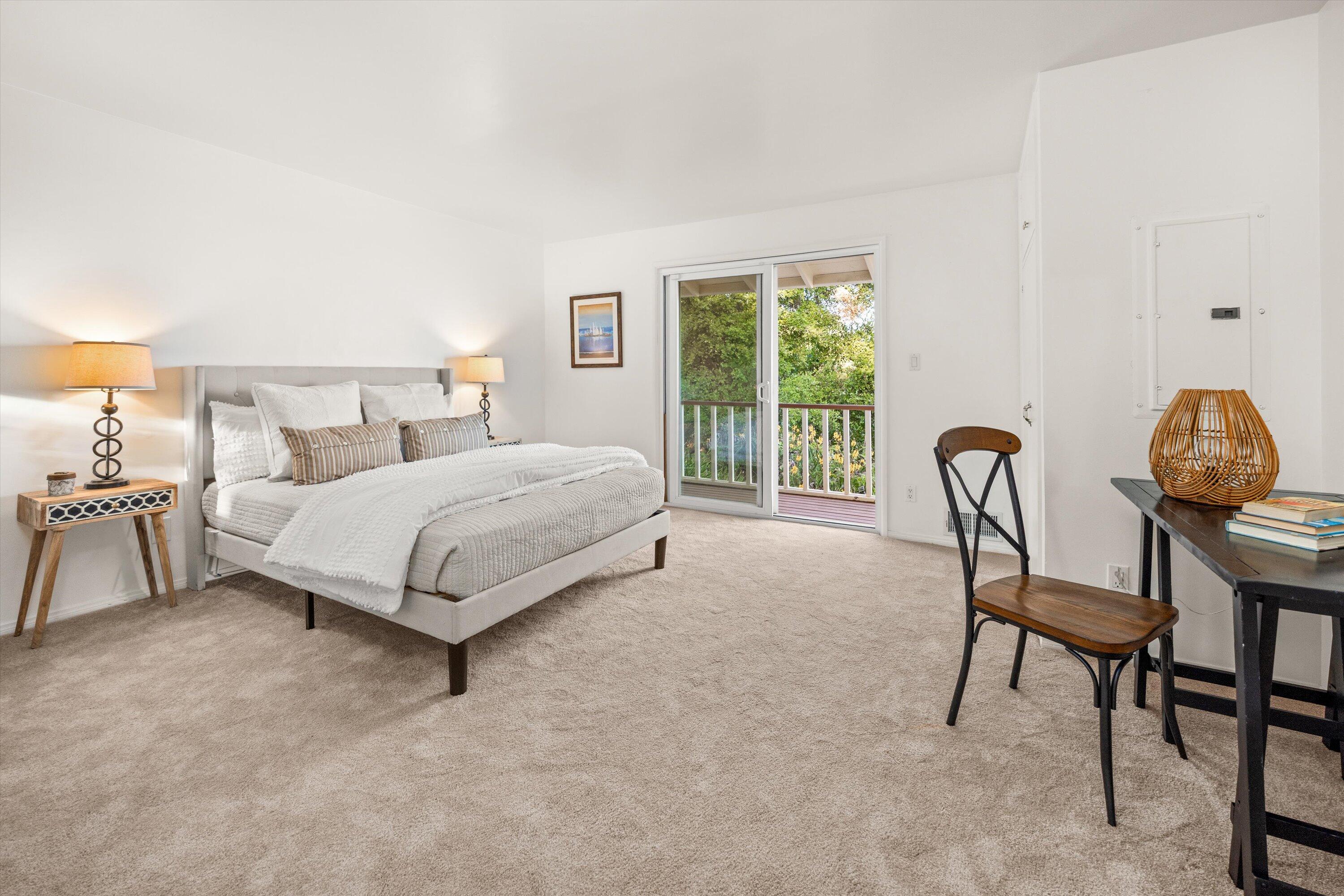 1227 Viscaino Road Santa Barbara, CA 93103 - Photo 18 of 25 a bed room with a bed and a chair