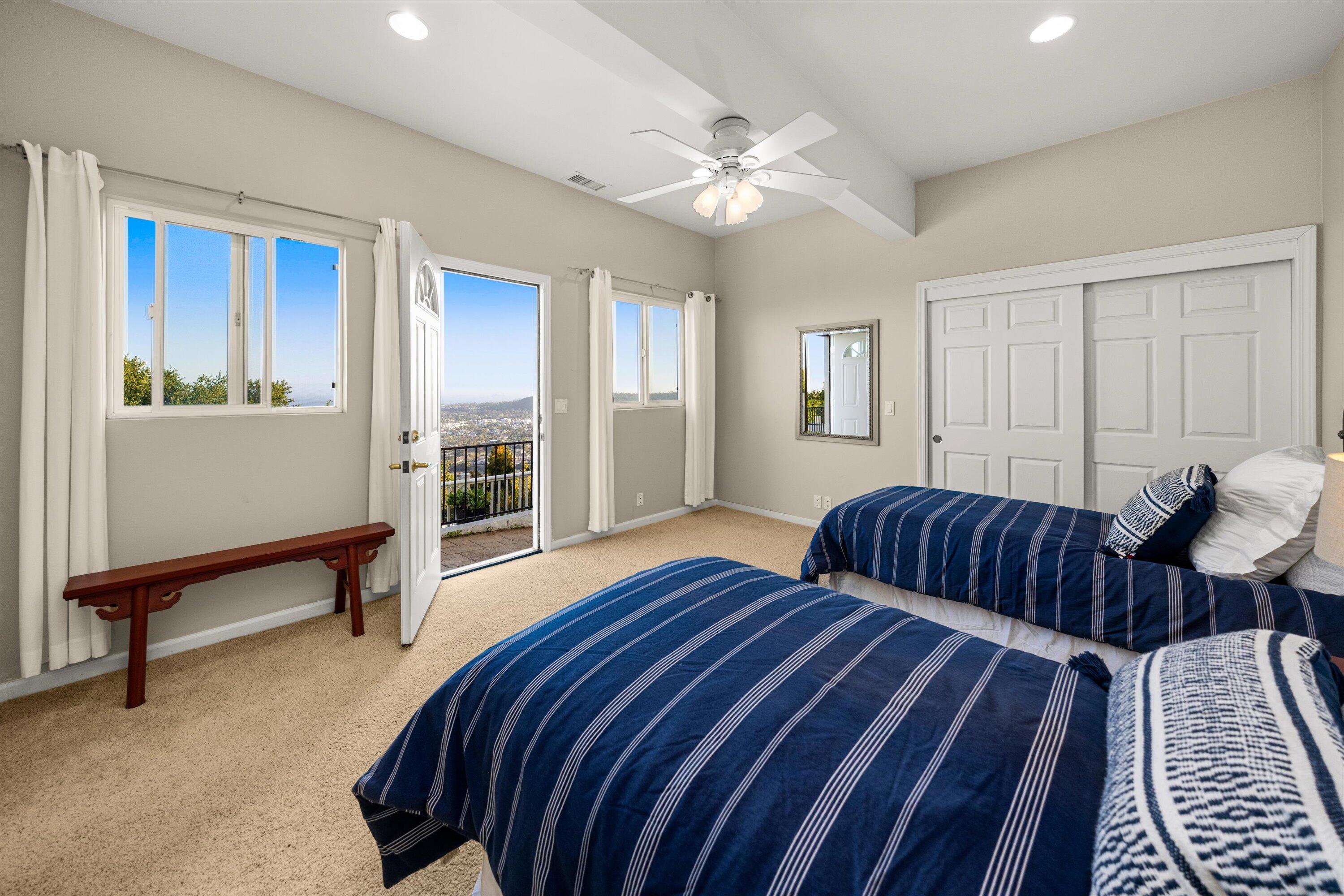 1227 Viscaino Road Santa Barbara, CA 93103 - Photo 19 of 25 a bedroom with furniture and a wooden floor