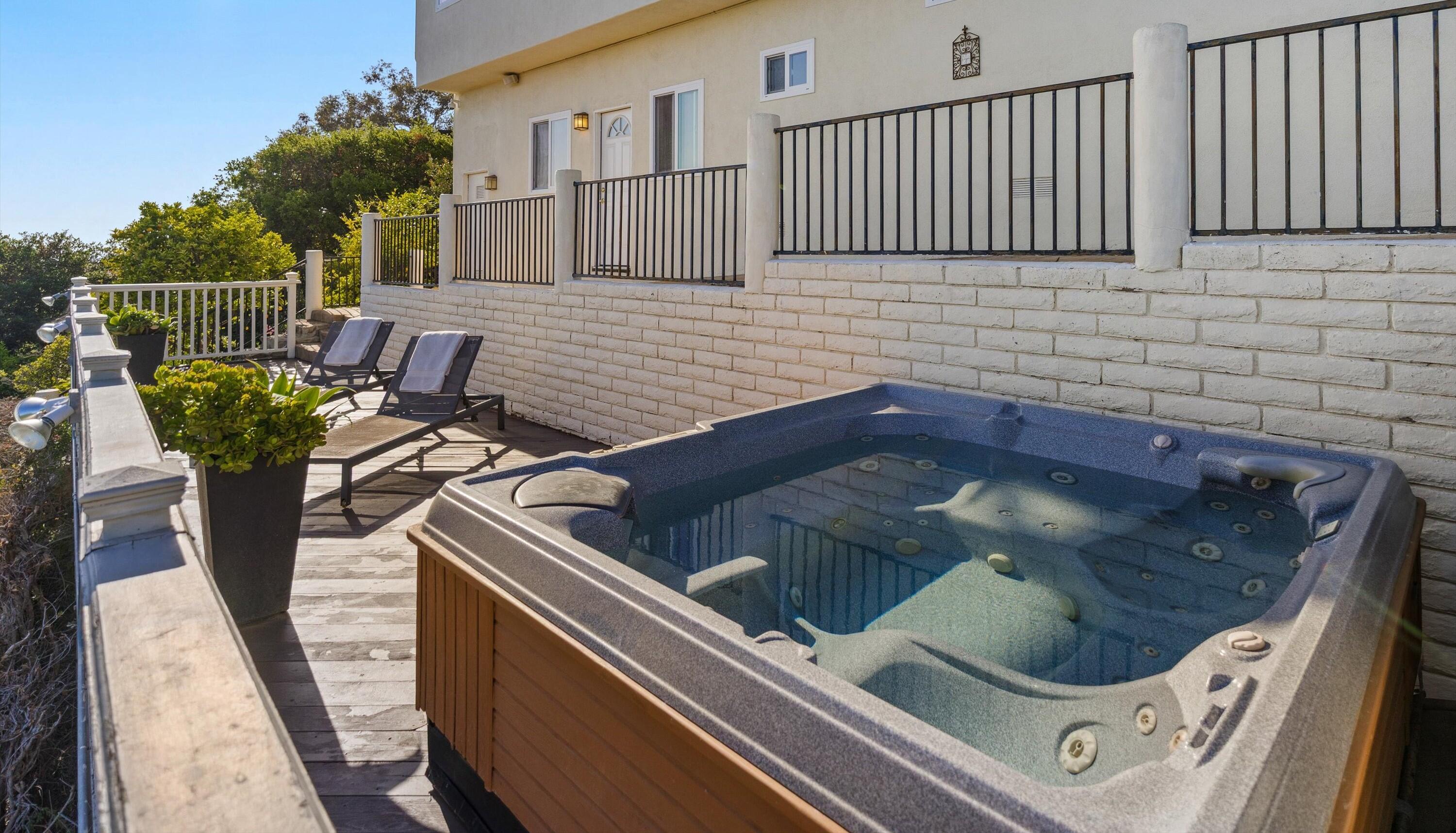 1227 Viscaino Road Santa Barbara, CA 93103 - Photo 21 of 25 a kitchen view living room with a sink and a wooden floor