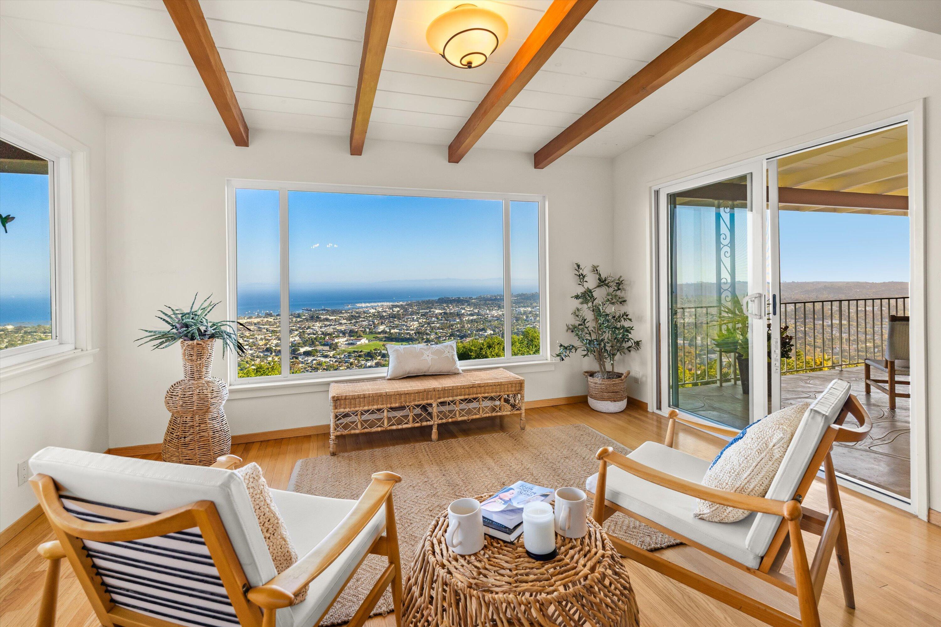 1227 Viscaino Road Santa Barbara, CA 93103 - Photo 4 of 25 a living room with furniture and a large window