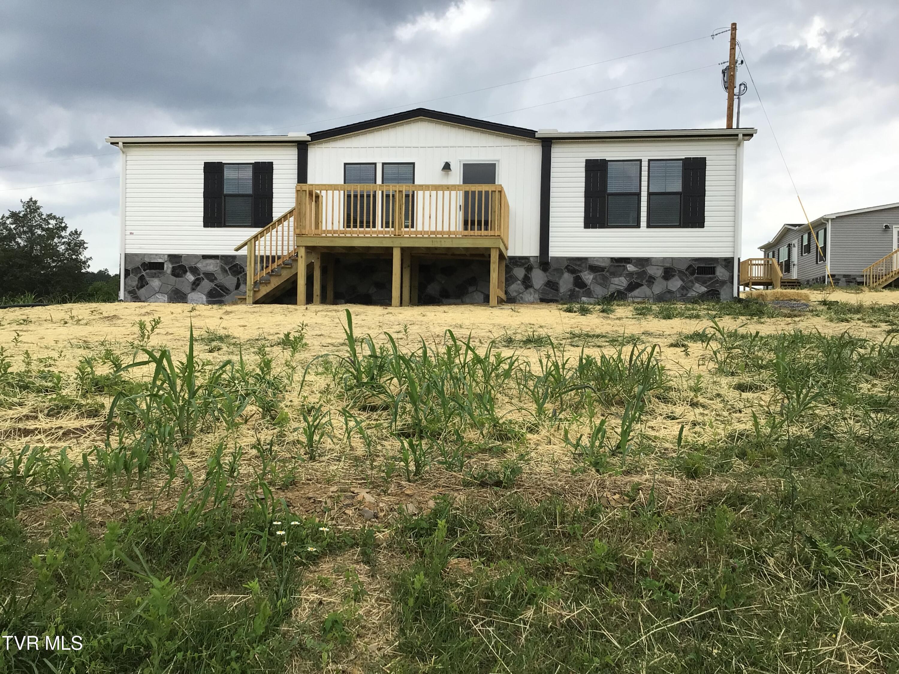 825 Dulaney Road Mosheim, TN 37818 - Photo 3 of 30 825 Dulaney Rd