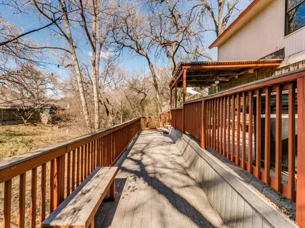 a view of balcony with furniture