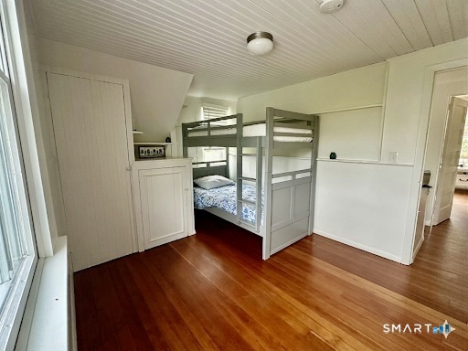 36 Attawan Road East Lyme, CT 06357 - Photo 28 of 40 Bedroom 2 looking back into Hallway. Tall and Short Closets provide lots of storage.
