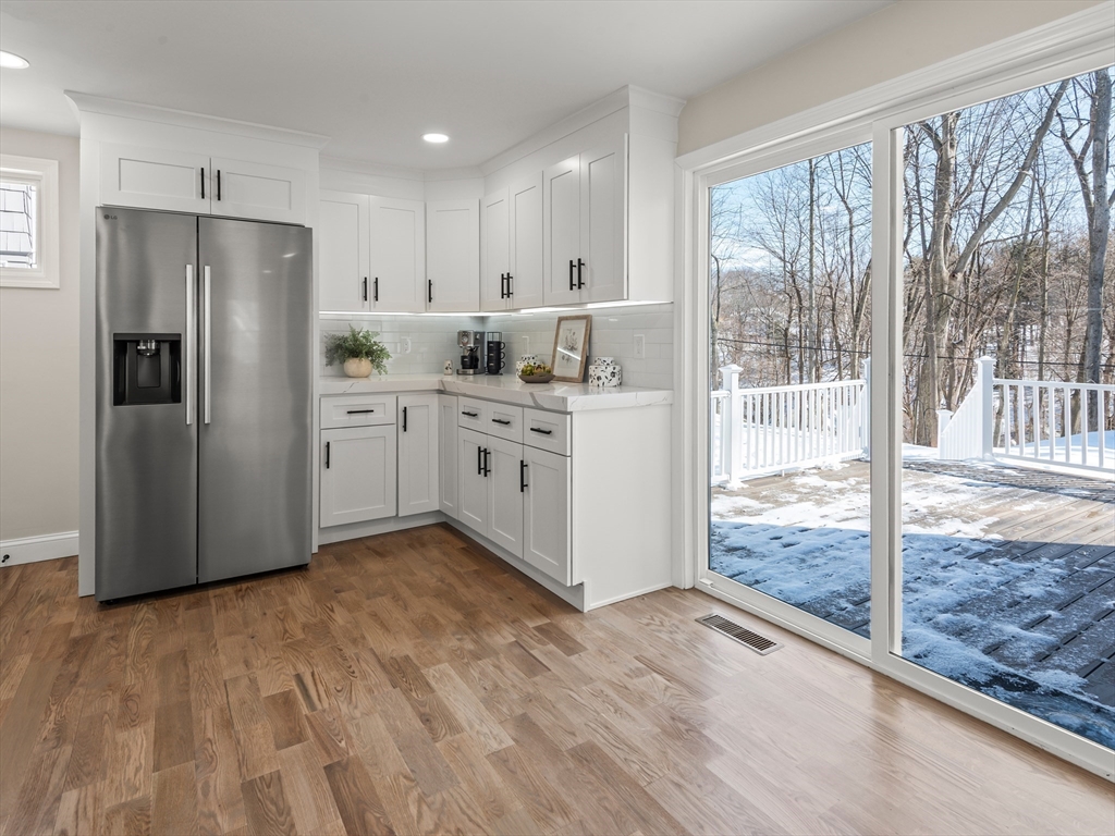 122 Copperfield Road Worcester, MA 01602 - Photo 13 of 30 a kitchen with stainless steel appliances granite countertop a refrigerator and a sink