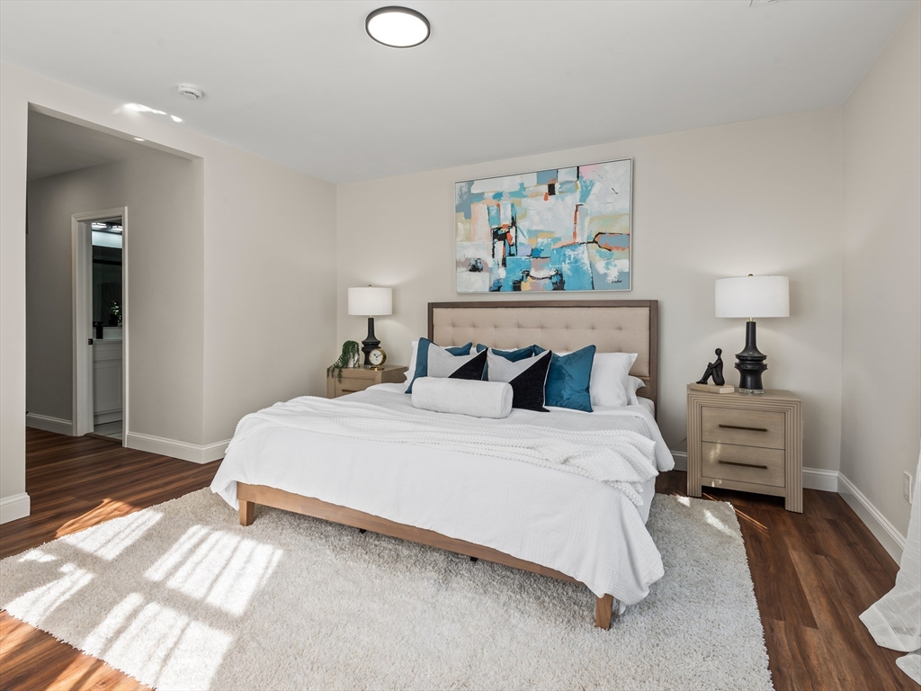 122 Copperfield Road Worcester, MA 01602 - Photo 18 of 30 a bedroom with furniture and painting on the wall