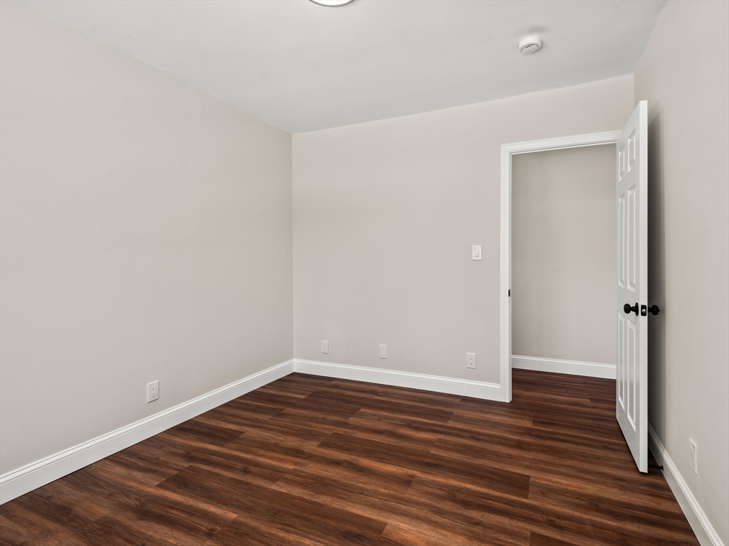 122 Copperfield Road Worcester, MA 01602 - Photo 27 of 30 a view of a room with wooden floor