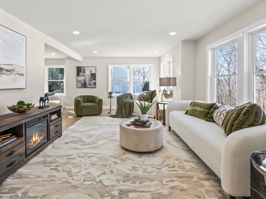 122 Copperfield Road Worcester, MA 01602 - Photo 4 of 30 a living room with furniture and a large window