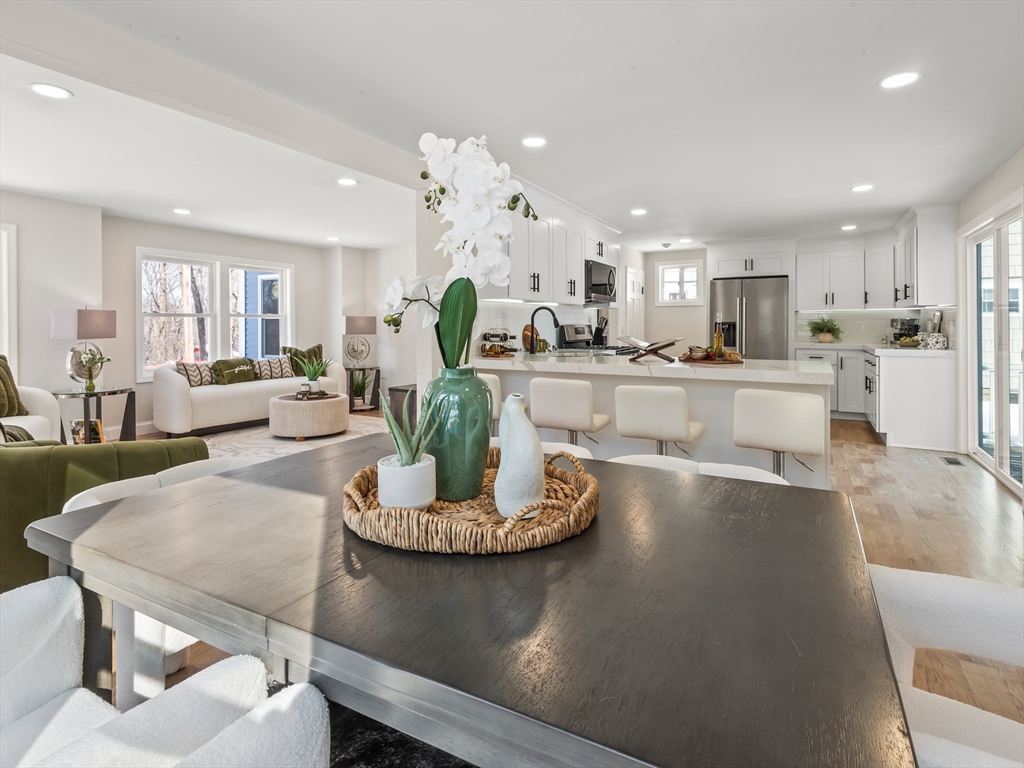 122 Copperfield Road Worcester, MA 01602 - Photo 9 of 30 a large kitchen with a table and chairs