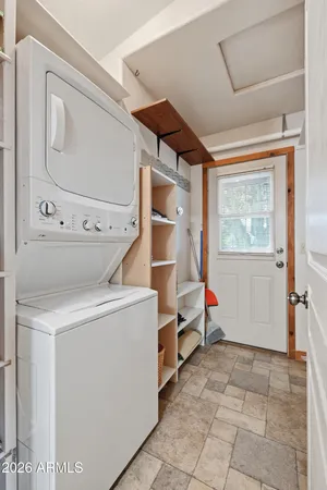 a view of a chairs and tables in the patio