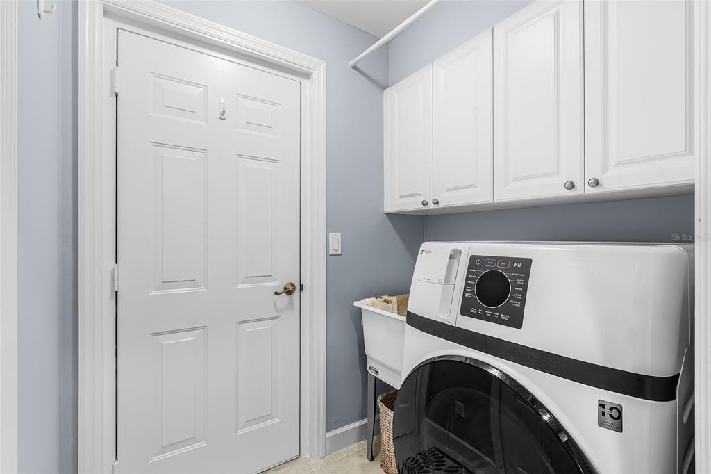 3312 Sunset Key Circle, Unit B Punta Gorda, FL 33955 - Photo 23 of 37 a utility room with dryer and washer