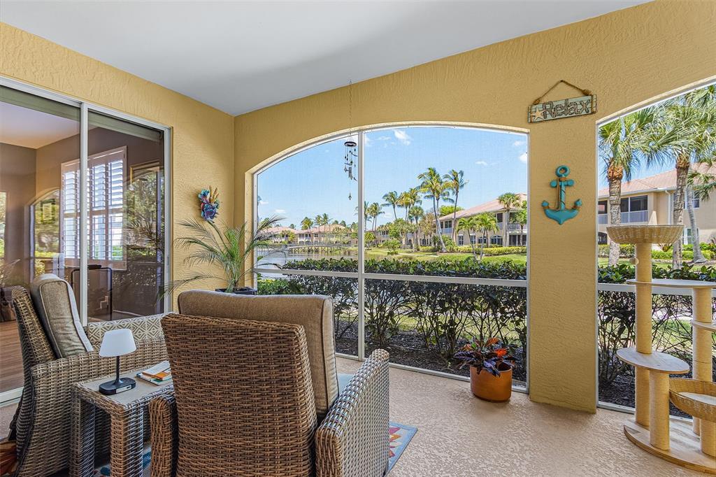 3312 Sunset Key Circle, Unit B Punta Gorda, FL 33955 - Photo 26 of 37 a view of an chairs and table in the balcony