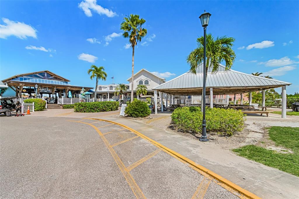 3312 Sunset Key Circle, Unit B Punta Gorda, FL 33955 - Photo 33 of 37 a front view of a house with garden