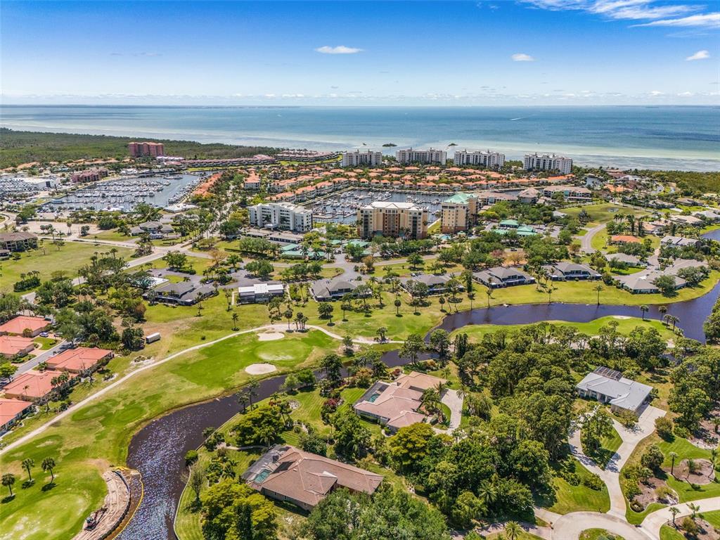 3312 Sunset Key Circle, Unit B Punta Gorda, FL 33955 - Photo 36 of 37 an aerial view of residential houses with outdoor space