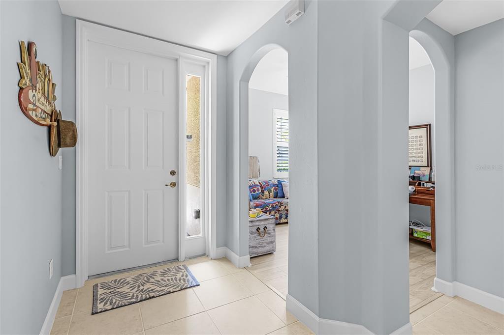 3312 Sunset Key Circle, Unit B Punta Gorda, FL 33955 - Photo 5 of 37 a view of an entryway with wooden floor