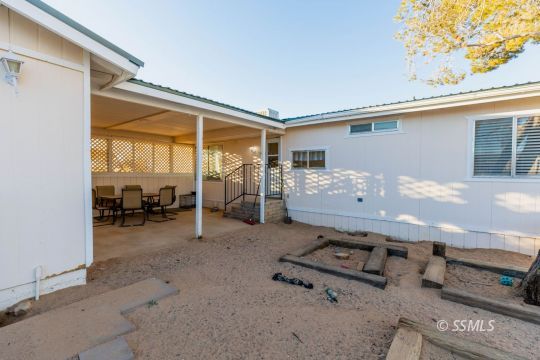 1221 Nocturne Street Ridgecrest, CA 93555 - Photo 27 of 32 a room with furniture