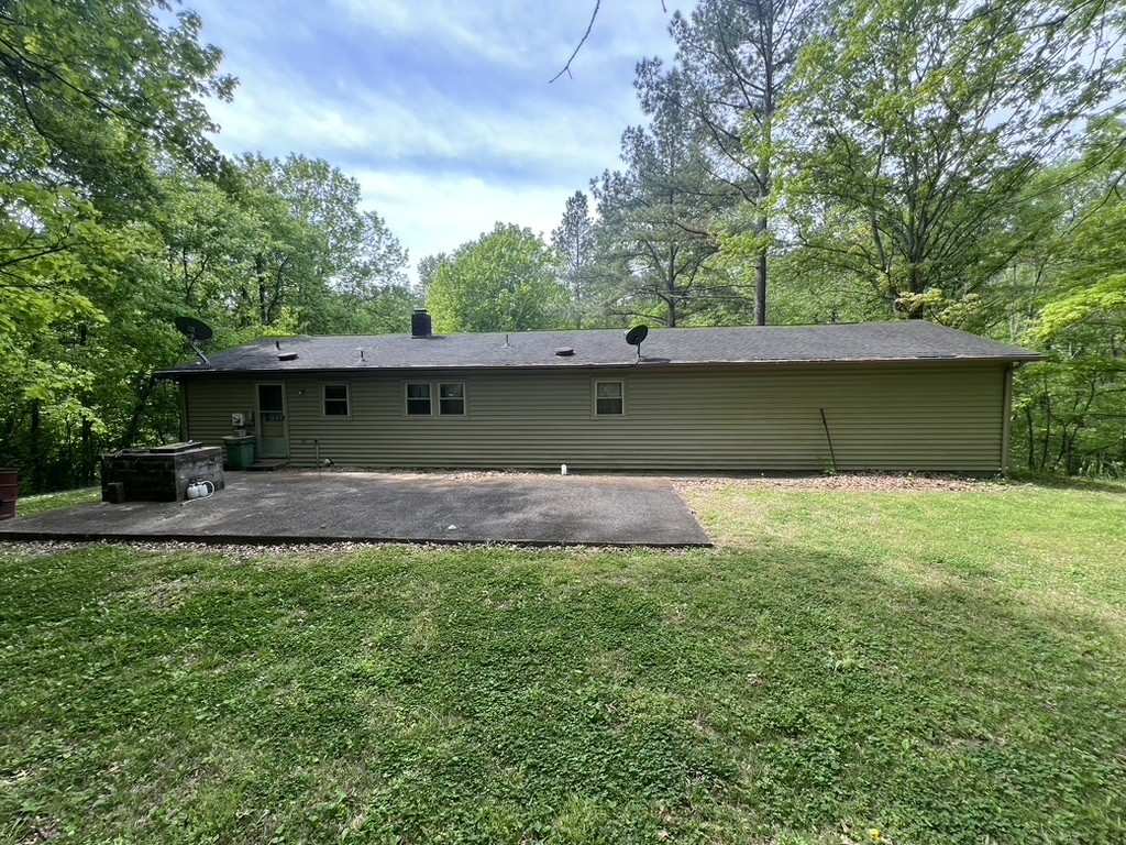 1860 Garrison Branch Road Cottontown, TN 37048 - Photo 2 of 13 a view of a house with a yard