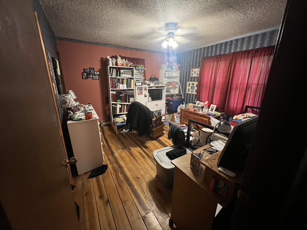 1860 Garrison Branch Road Cottontown, TN 37048 - Photo 9 of 13 a view of a workspace with furniture and chandelier