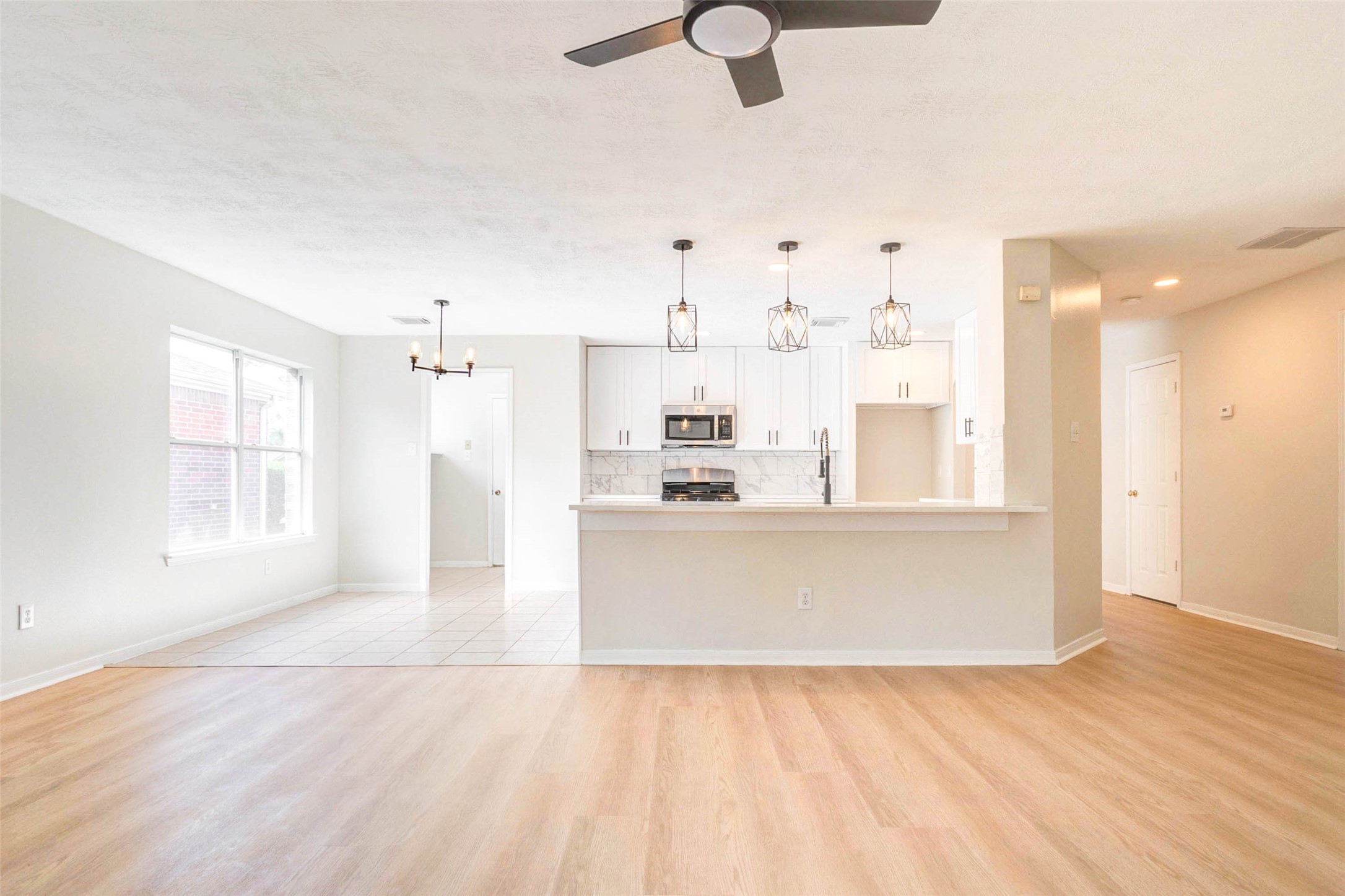 5318 Cilantro Lane Baytown, TX 77521 - Photo 17 of 45 a view of kitchen with furniture and window