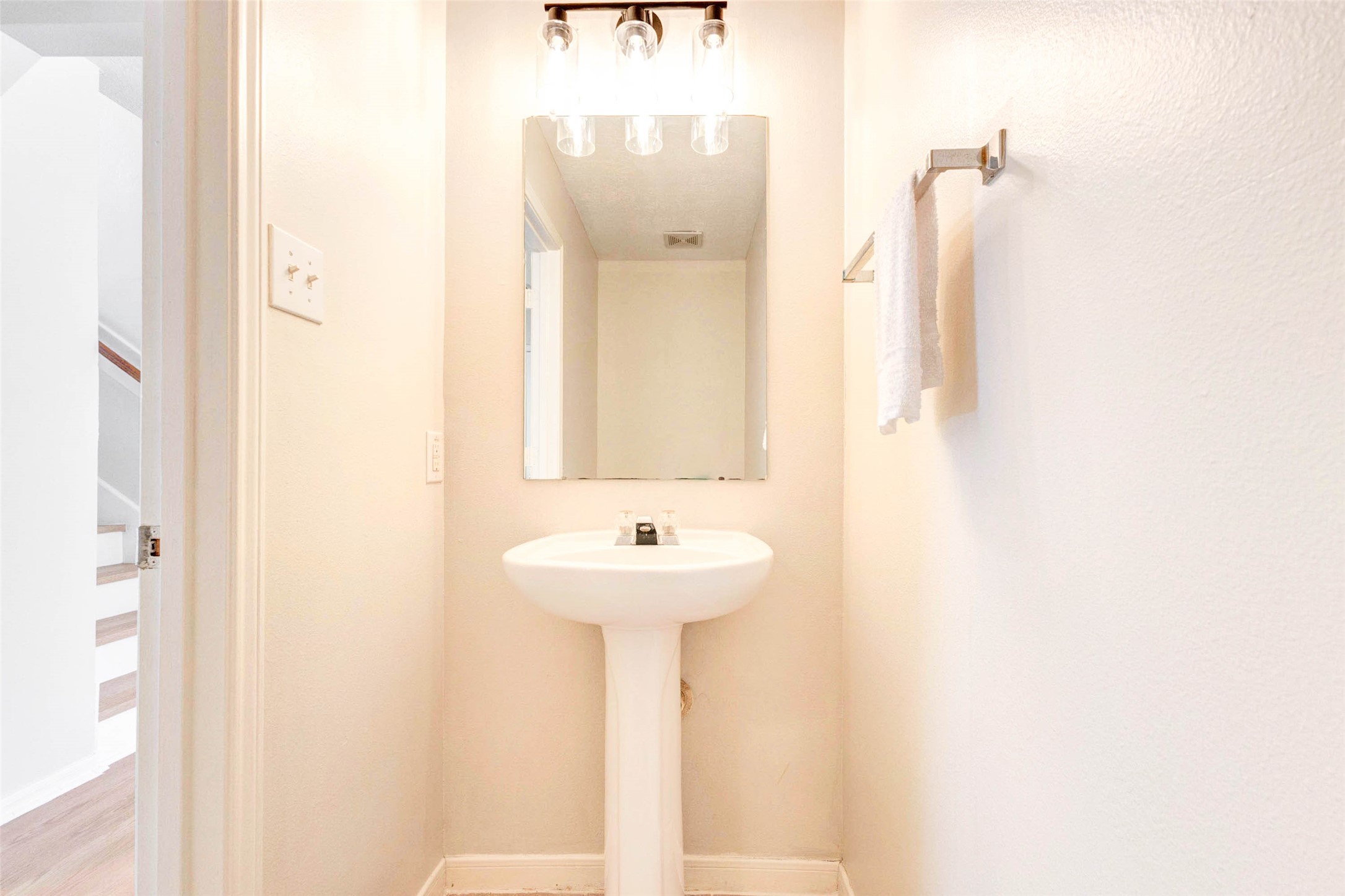 5318 Cilantro Lane Baytown, TX 77521 - Photo 22 of 45 a bathroom with a sink and a mirror