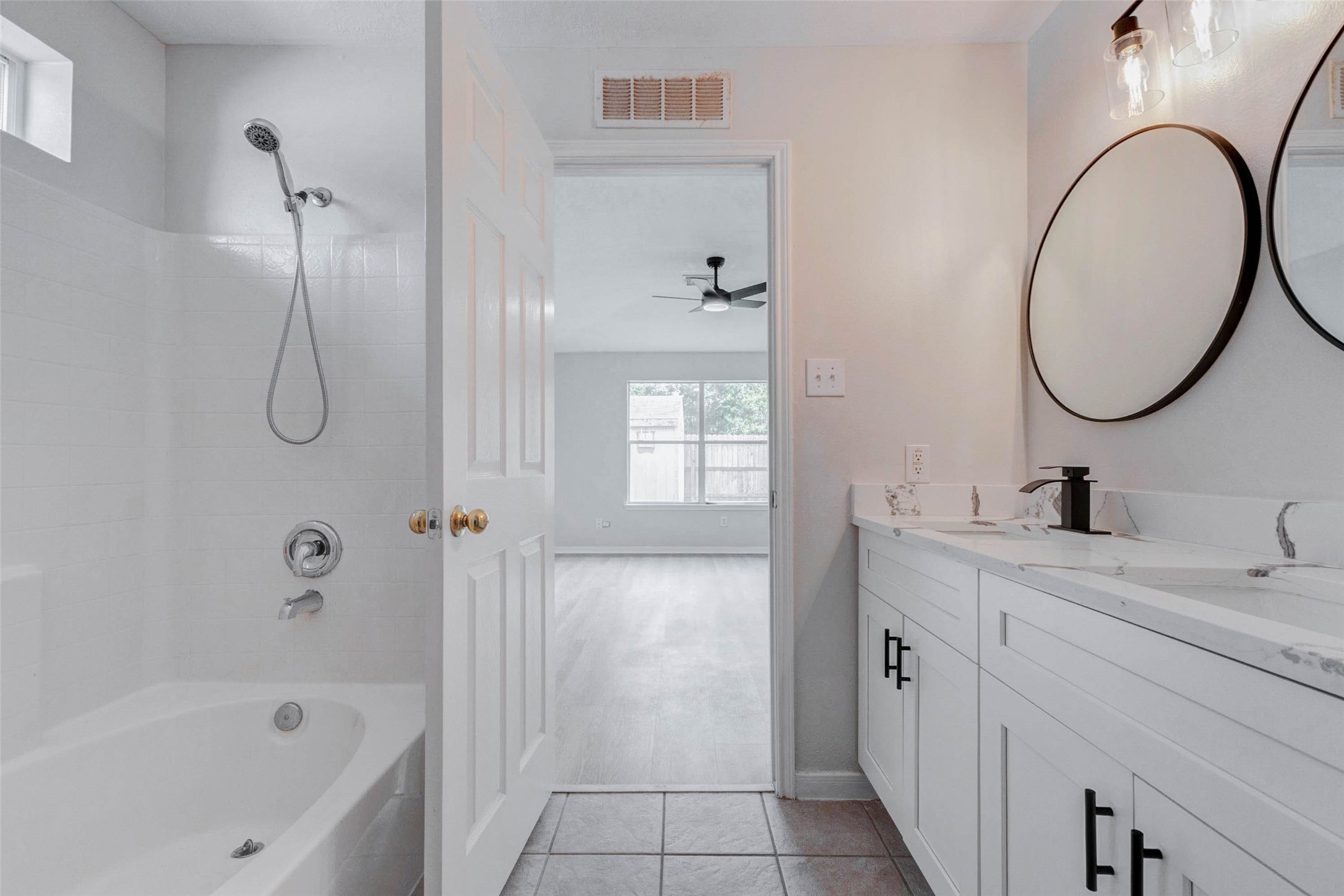 5318 Cilantro Lane Baytown, TX 77521 - Photo 28 of 45 a bathroom with a sink and a mirror