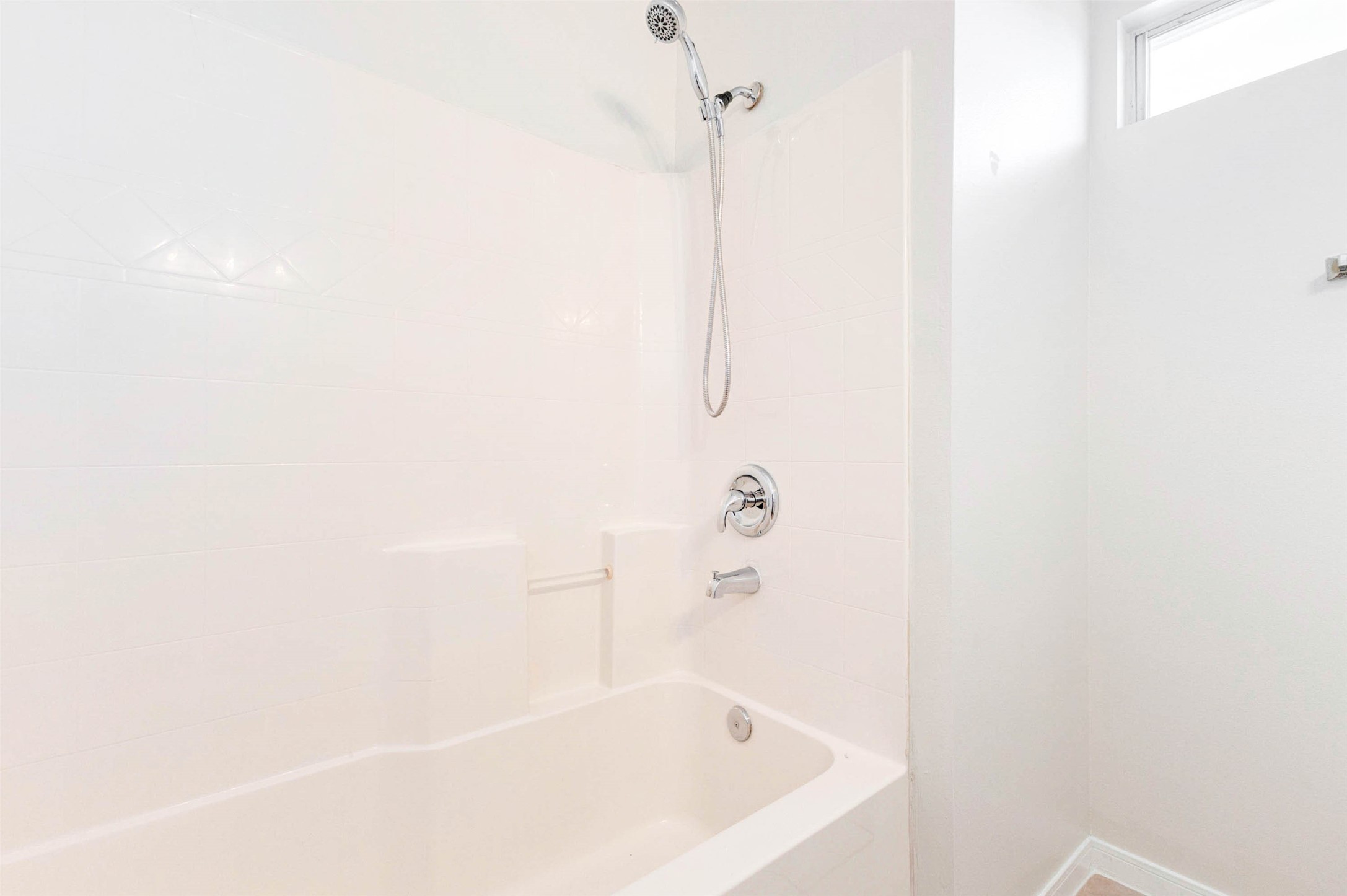 5318 Cilantro Lane Baytown, TX 77521 - Photo 38 of 45 a bathroom with a bathtub