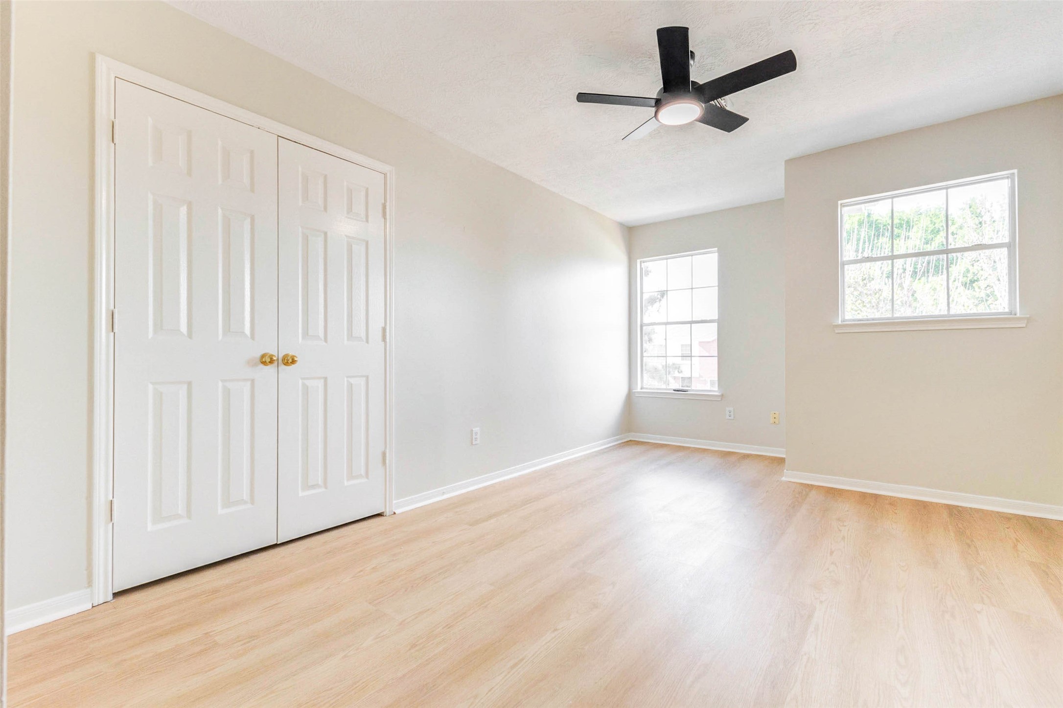 5318 Cilantro Lane Baytown, TX 77521 - Photo 40 of 45 wooden floor in an empty room with a window