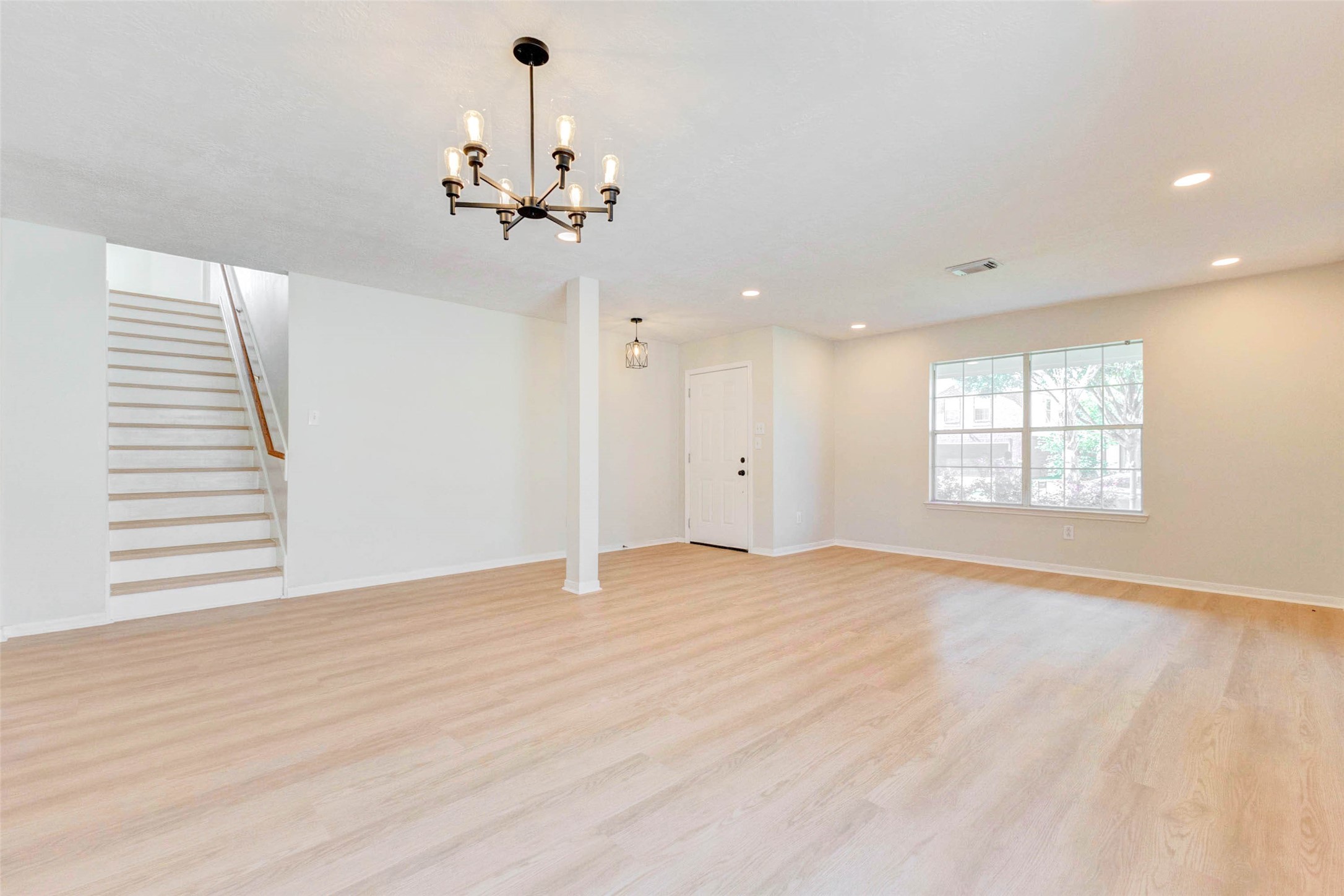 5318 Cilantro Lane Baytown, TX 77521 - Photo 8 of 45 a view of an empty room with a window