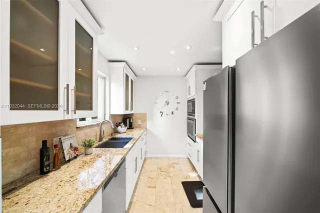 a view of a chair and table of the garden