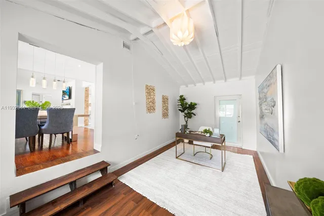 a living room with furniture and a table