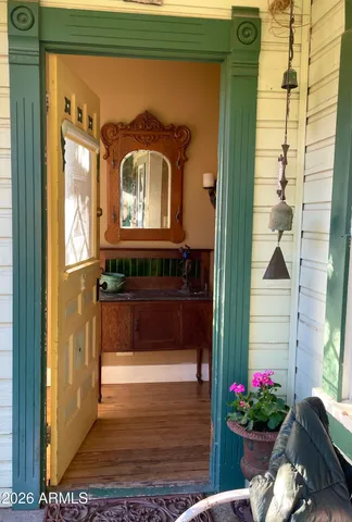 a view of a room that has a bed