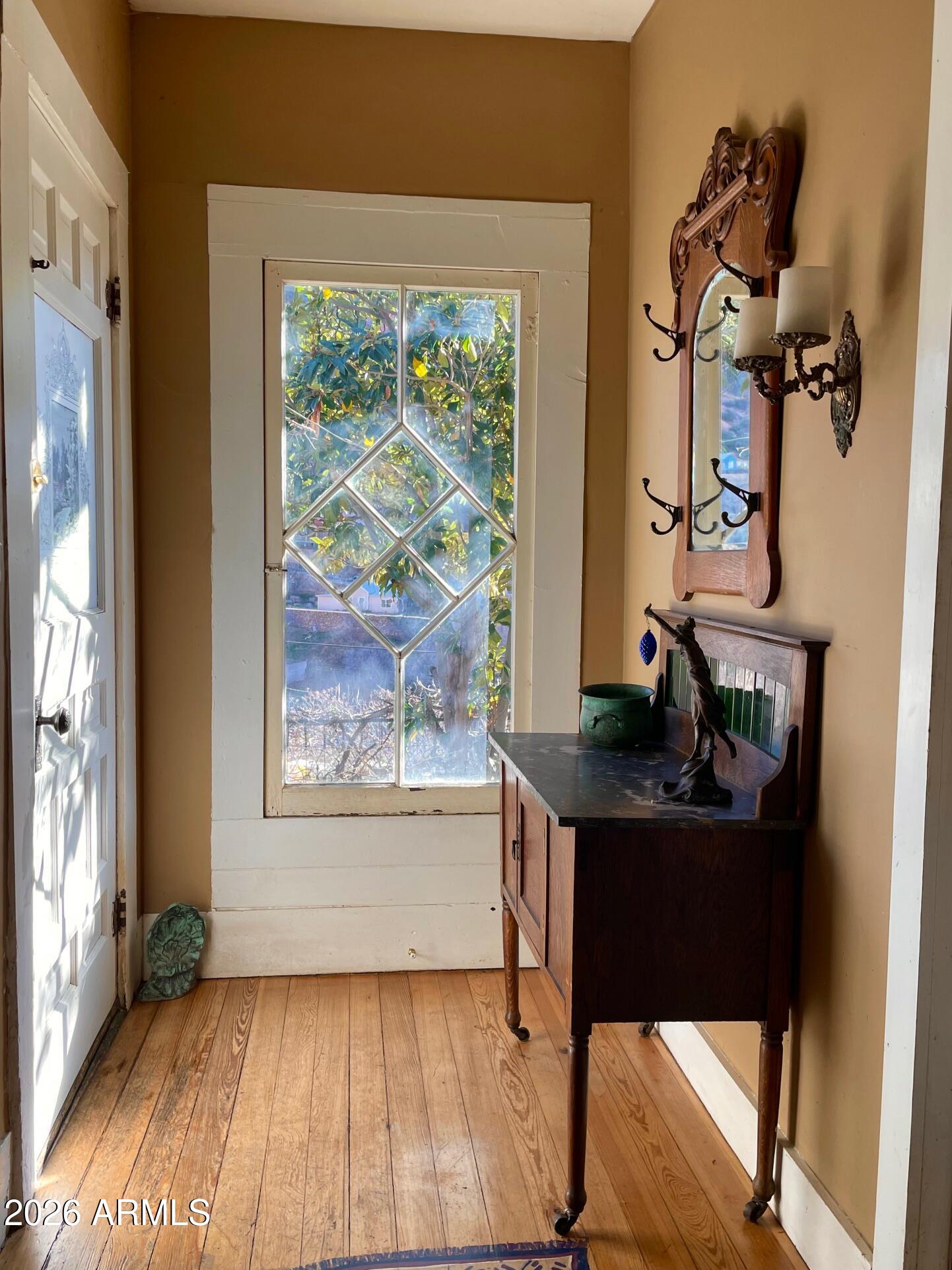 132 Opera Drive Bisbee, AZ 85603 - Photo 16 of 62 a living room with furniture and a window