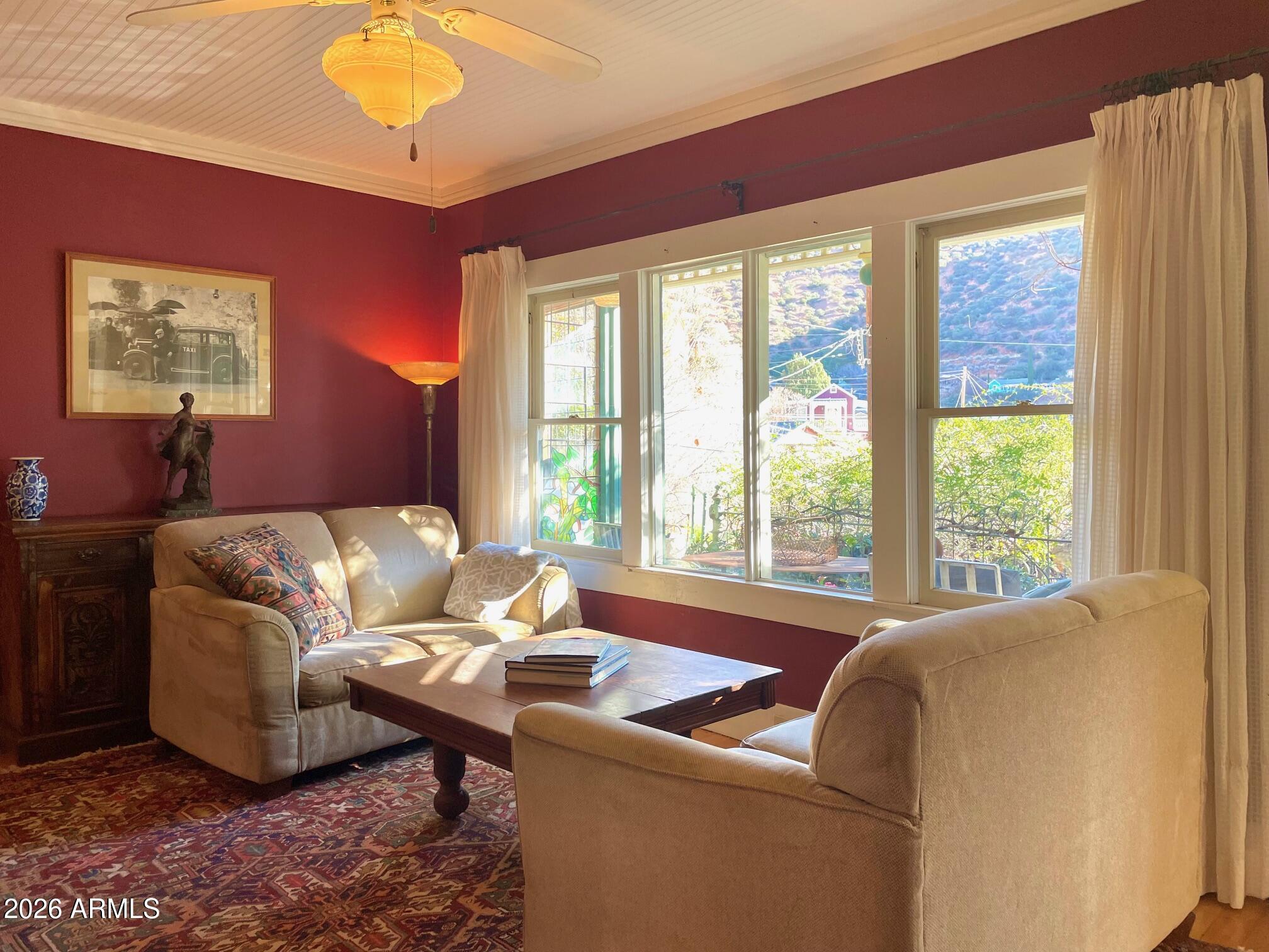 132 Opera Drive Bisbee, AZ 85603 - Photo 18 of 62 a living room with furniture and a large window