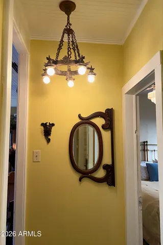 a room with a fireplace and windows