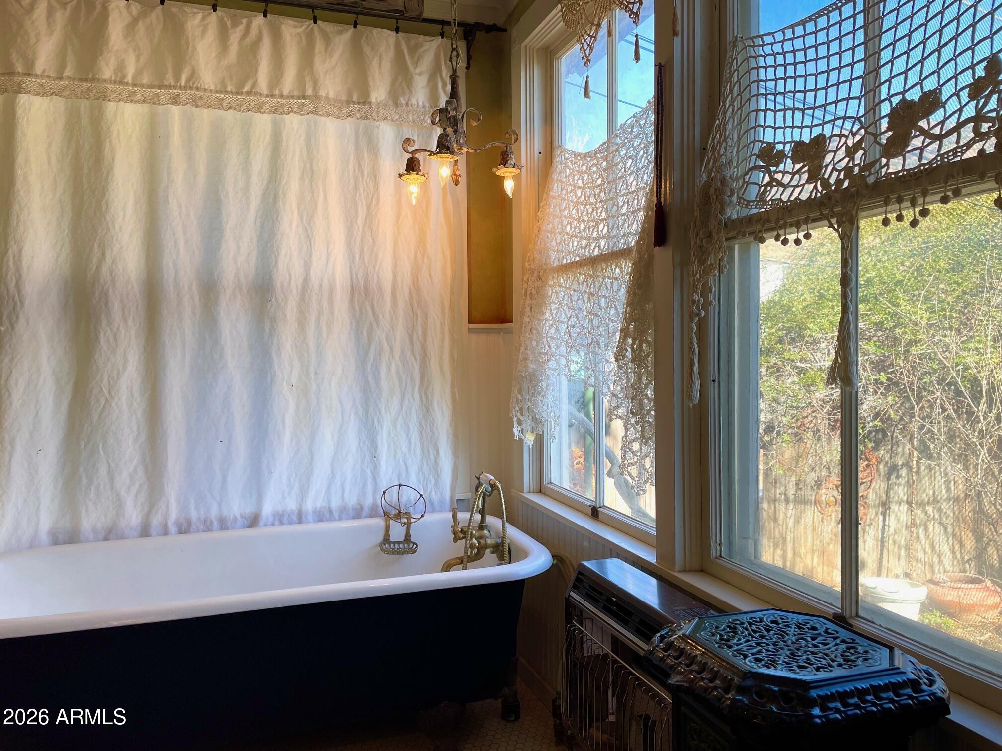 132 Opera Drive Bisbee, AZ 85603 - Photo 36 of 62 a bathroom with a sink and a mirror
