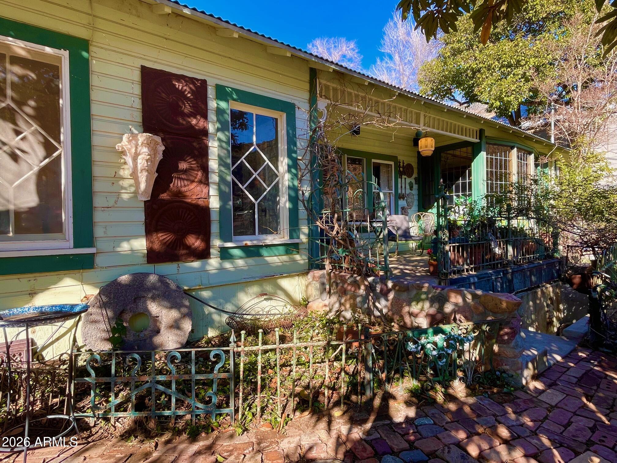 132 Opera Drive Bisbee, AZ 85603 - Photo 7 of 62 a view of a cafe with sitting area