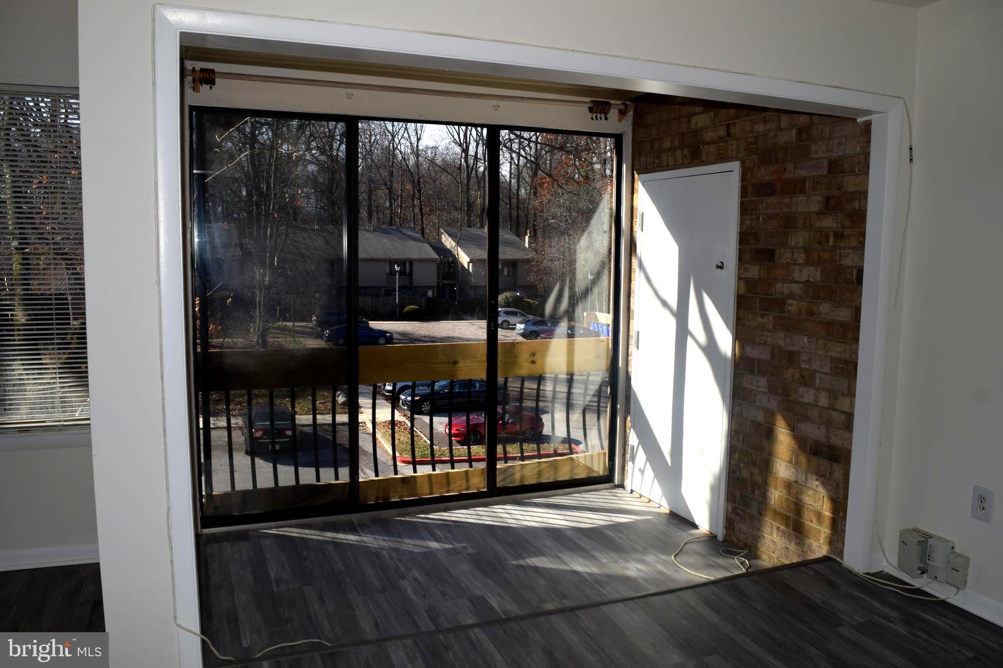 10566 Twin Rivers Road, Unit F1 Columbia, MD 21044 - Photo 6 of 44 Sun Room