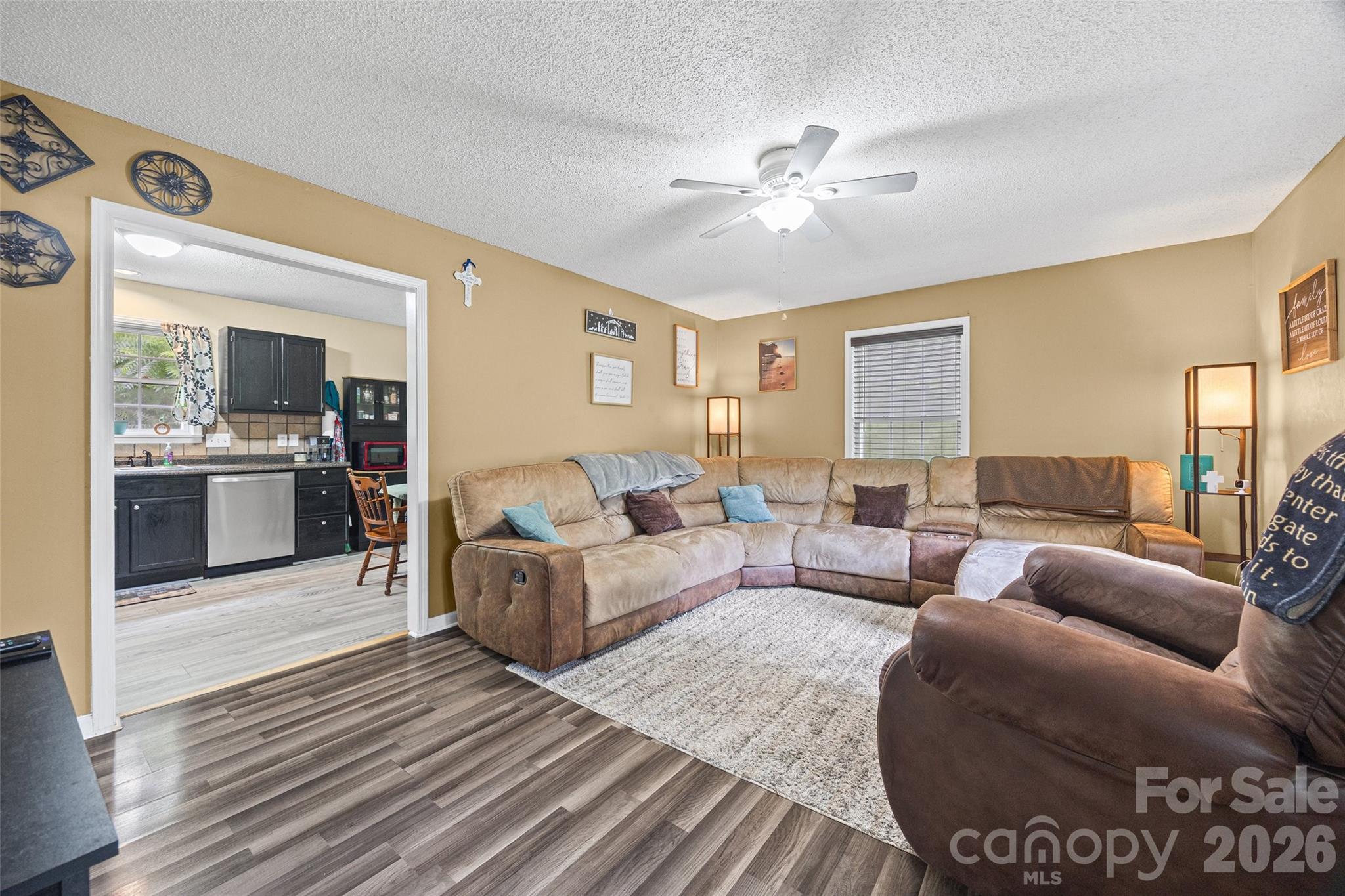 30 7th Street York, SC 29745 - Photo 4 of 29 a living room with furniture and a chandelier