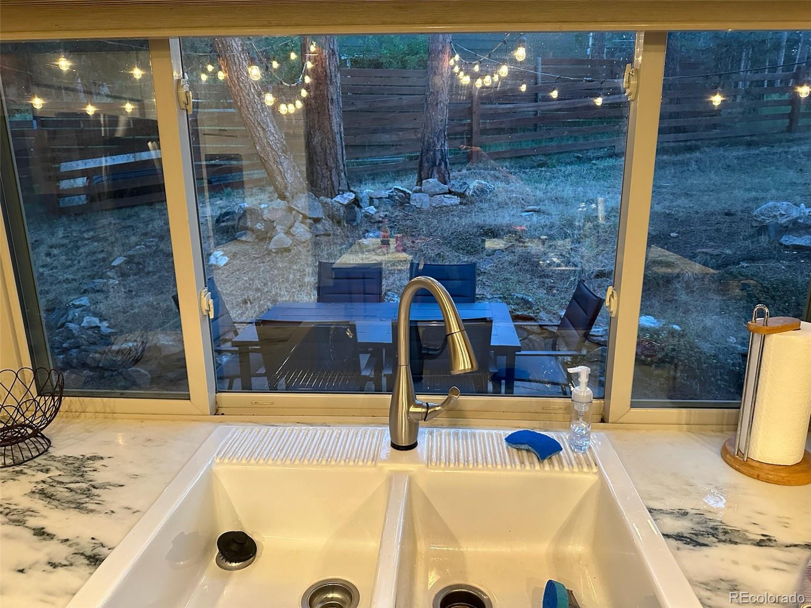 974 Wagon Trail Road Evergreen, CO 80439 - Photo 16 of 45 a view of a swimming pool