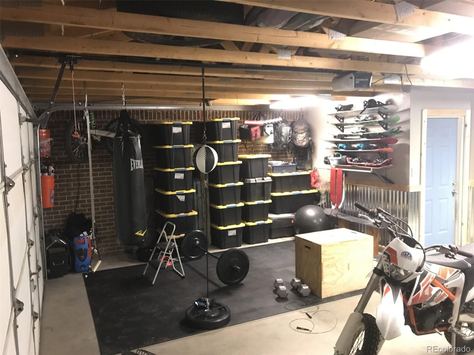 974 Wagon Trail Road Evergreen, CO 80439 - Photo 33 of 45 a room with musical instruments