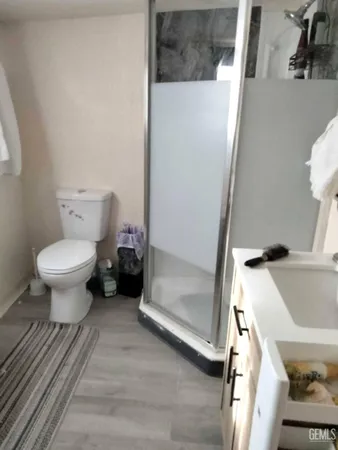 a bathroom with a sink and a toilet