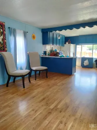 a room with furniture and a chair