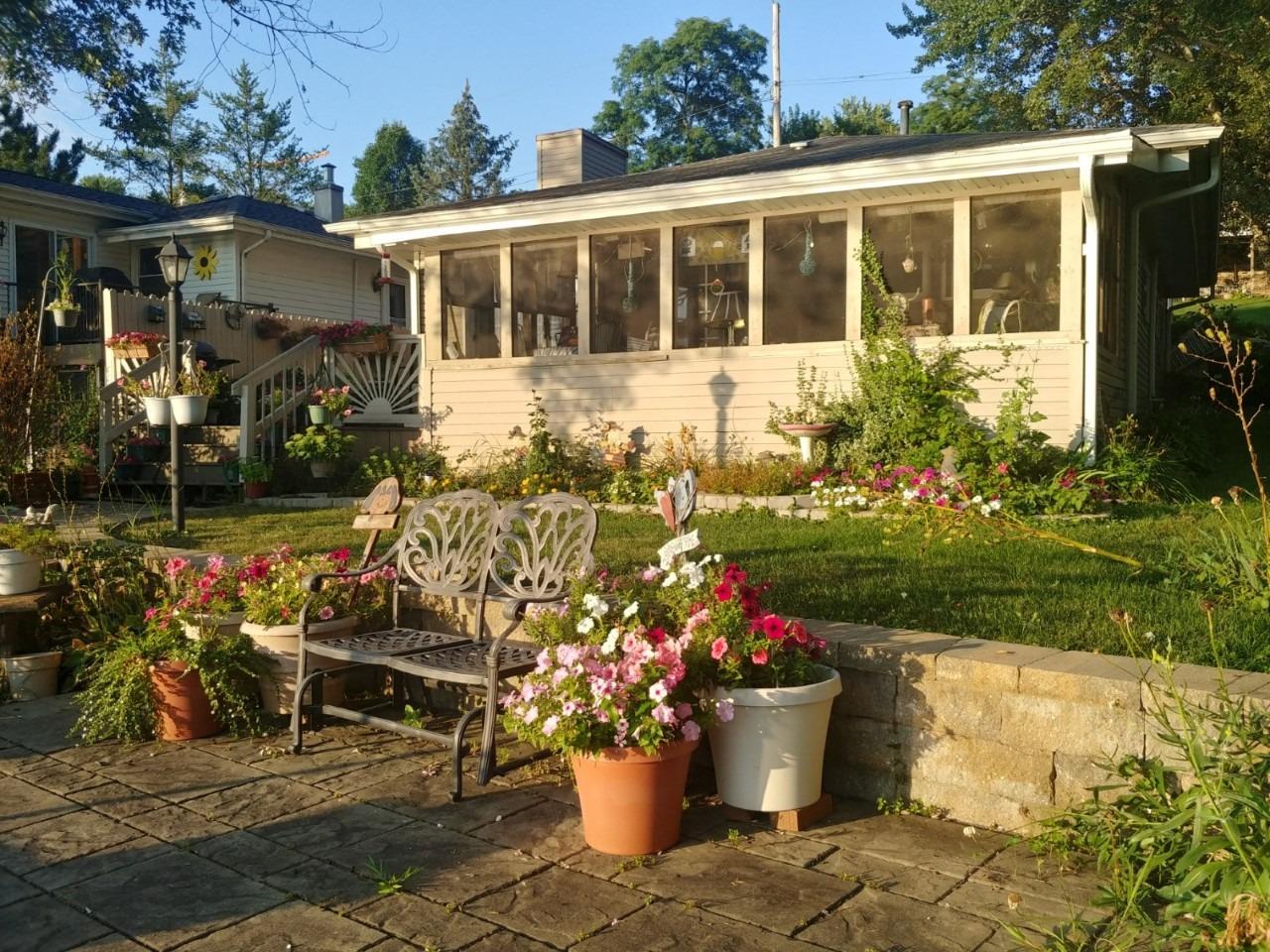 a front view of a house having patio