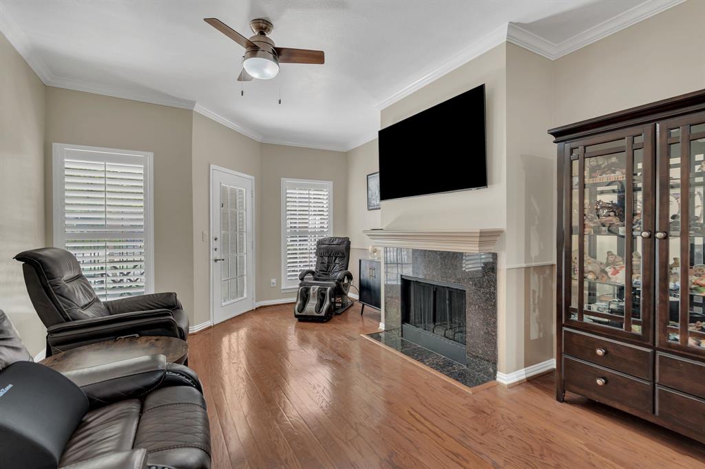 2524 Preston Road, Unit 1205 Plano, TX 75093 - Photo 14 of 31 Living Room looking toward TV and the back patio adjacent to the pool